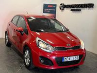 Begagnad Kia Rio 109 HK (80 kW) 2011 Röd Halvkombi