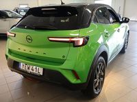 Begagnad Opel Mokka-e GS Line 100 kW (136 HK) 2022 Grön SUV