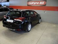 begagnad Toyota Auris Touring Sports Hybrid e-CVT Comfort lågmil