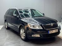 Begagnad Skoda Octavia Elegance 105 HK (77 kW) 2013 Svart Kombi