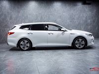 begagnad Kia Optima Hybrid Sport Wagon Plug-in Plus 2 Drag Pano Navi