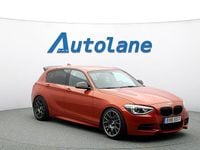 Begagnad BMW M135 M Performance 360 HK (264 kW) 2014 Valencia orange metallic Halvkombi