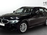 Begagnad BMW 330e Shadowline 2022 Svart Kombi