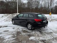 Begagnad Opel Astra Enjoy 110 HK (80 kW) 2012 Svart Kombi