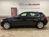 Begagnad BMW 118 Sport Line 143 HK (105 kW) 2014 Svart Halvkombi