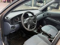 Begagnad Nissan Almera 98 HK (72 kW) 2006 Brun