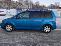 Begagnad VW Touran 150 HK (110 kW) 2005 Blå Minibuss