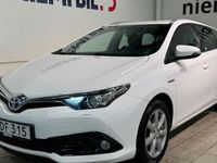 begagnad Toyota Auris Touring Sports Hybrid e-CVT Kamera Kamkedja SoV 2016, Halvkombi