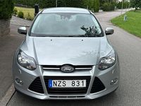 Begagnad Ford Focus Titanium 101 HK (74 kW) 2013 Grå Kombi