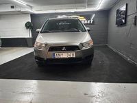 Begagnad Mitsubishi Colt 97 HK (71 kW) 2009 Grå Halvkombi