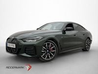 Begagnad BMW i4 Shadowline 250 kW (340 HK) 2023 Grön Sedan