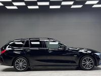 Begagnad BMW 330e 184 HK (135 kW) 2022 Svart Kombi