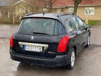 Begagnad Peugeot 308 SW 109 HK (80 kW) 2009 Svart Kombi