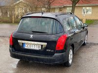 Begagnad Peugeot 308 SW 109 HK (80 kW) 2009 Svart Kombi