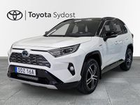 Begagnad Toyota RAV4 Hybrid Style 220 HK (161 kW) 2019 White pearl med svart tak SUV