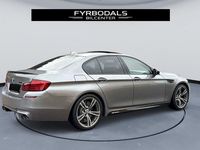Begagnad BMW M5 M Performance 560 HK (411 kW) 2012 Grå Sedan