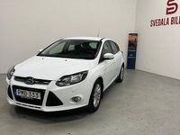 Begagnad Ford Focus Titanium 125 HK (91 kW) 2014 Vit Halvkombi