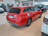begagnad Toyota Auris Touring Sports Hybrid e-CVT Euro 5 2015, Halvkombi
