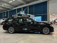 Begagnad BMW 330e Sport Line 292 HK (214 kW) 2021 Svart Kombi