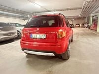 Begagnad Suzuki SX4 120 HK (88 kW) 2011 Röd Halvkombi