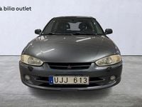 Begagnad Mitsubishi Colt 103 HK (75 kW) 2003 Mgrå Halvkombi