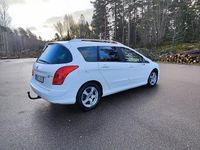 Begagnad Peugeot 308 SW 112 HK (82 kW) 2012 Vit Kombi