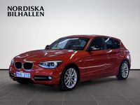 Begagnad BMW 118 Sport Line 143 HK (105 kW) 2012 Orange Halvkombi