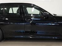 Begagnad BMW 330e 2021 Svart Kombi