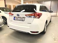 begagnad Toyota Auris Touring Sports Hybrid e-CVT Automat 2 ägare