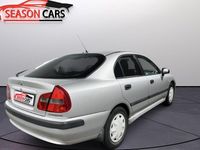 Begagnad Mitsubishi Carisma Comfort Edition 125 HK (91 kW) 2001 Grå Halvkombi