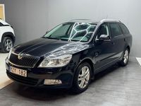 Begagnad Skoda Octavia Elegance 105 HK (77 kW) 2013 Svart Kombi