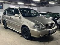 Begagnad Kia Carnival 150 HK (110 kW) 2003 Ljusgrå Minibuss