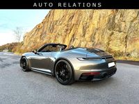 Begagnad Porsche 911 Carrera 4 GTS 480 HK (353 kW) 2023 Mörk grå agate grey metallic