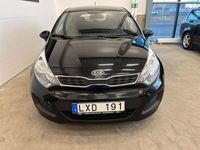 Begagnad Kia Rio 85 HK (62 kW) 2011 Svart Halvkombi