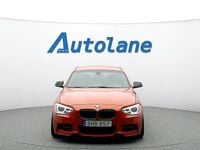 Begagnad BMW M135 M Performance 360 HK (264 kW) 2014 Valencia orange metallic Halvkombi