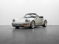 Begagnad Porsche 911 Carrera 250 HK (183 kW) 1992 Zermatt silver metallic / svart top Cab