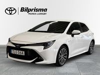Begagnad Toyota Corolla Hybrid Style 124 HK (91 kW) 2020 Vit Halvkombi