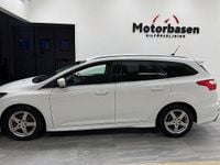 Begagnad Ford Focus Titanium 125 HK (91 kW) 2013 Vit Kombi