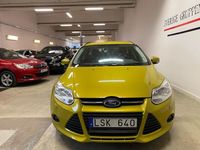 Begagnad Ford Focus Trend 95 HK (69 kW) 2011 Gul Kombi