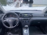Begagnad Toyota Corolla 110 HK (80 kW) 2002 Light grey Kombi
