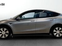 Begagnad Tesla Model Y Long Range AWD 378 kW (514 HK) 2023 Grå SUV