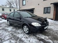 Begagnad Nissan Primera 140 HK (102 kW) 2002 Svart Sedan