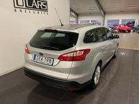 Begagnad Ford Focus Titanium 101 HK (74 kW) 2014 Ljusgrå Kombi