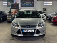 Begagnad Ford Focus Titanium 125 HK (91 kW) 2014 Grå Kombi