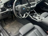 begagnad BMW 330e xDrive Touring Steptronic Sport line Euro 6