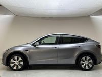 Begagnad Tesla Model Y Long Range RWD 250 kW (340 HK) 2024 Grå SUV