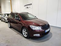 Begagnad Skoda Octavia Elegance 105 HK (77 kW) 2010 Mörkröd Kombi