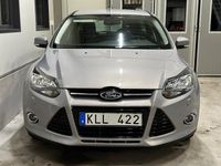 Begagnad Ford Focus Titanium 125 HK (91 kW) 2012 Grå Kombi