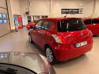 Begagnad Suzuki Swift 94 HK (69 kW) 2011 Röd Halvkombi