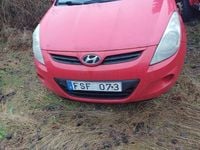 Begagnad Hyundai i20 101 HK (74 kW) 2009 Röd Halvkombi
